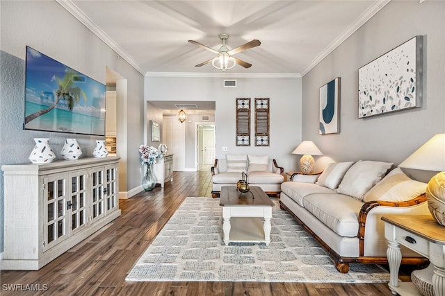 living room with hardwood / wood-style floors, ceiling fan, and crown molding