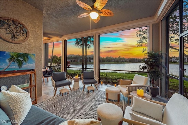 9229 Museo Cir Unit 102, Naples, FL 34114 - sunroom / solarium with a water view, tile patterned floors, and a textured ceiling