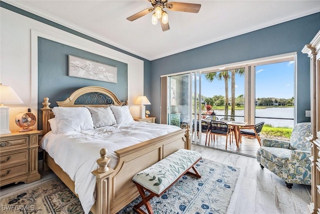 9229 Museo Cir Unit 102, Naples, FL 34114 - bedroom featuring access to outside, a water view, light wood-type flooring, crown molding, and a ceiling fan