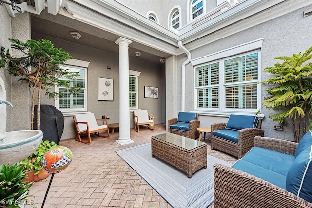 view of patio / terrace featuring a grill and an outdoor hangout area