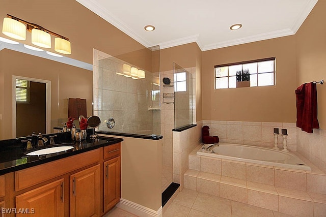 bathroom featuring vanity, crown molding, tile patterned flooring, and plus walk in shower