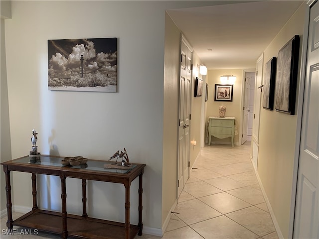 hallway with light tile patterned floors