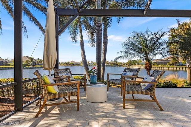 view of patio featuring a water view