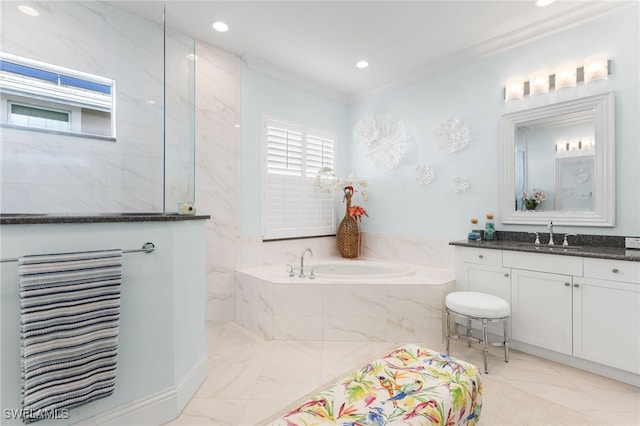 bathroom featuring vanity, crown molding, a wealth of natural light, and tiled bath