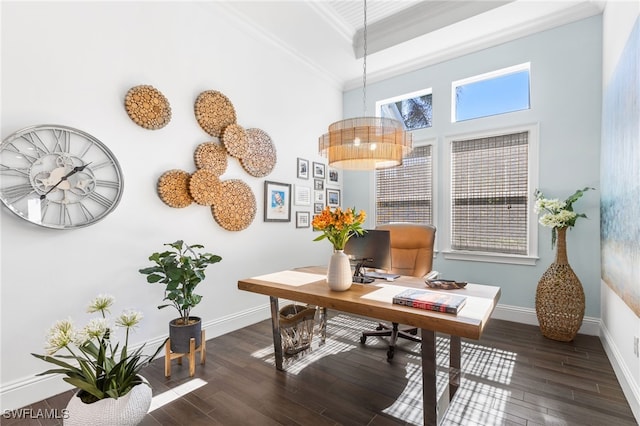 office area featuring a high ceiling, dark hardwood / wood-style floors, and ornamental molding