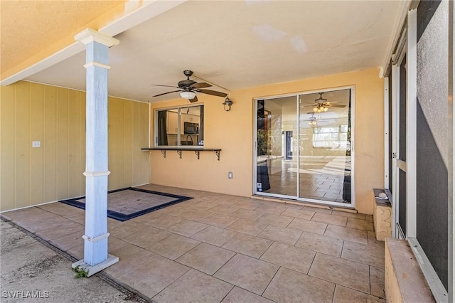 view of patio / terrace with ceiling fan