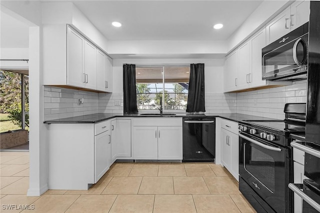 kitchen with white cabinetry, sink, decorative backsplash, light tile patterned floors, and black appliances