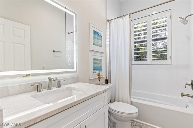 full bathroom with shower / bath combo, toilet, and vanity