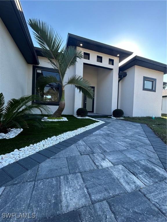 view of front of house with a patio area