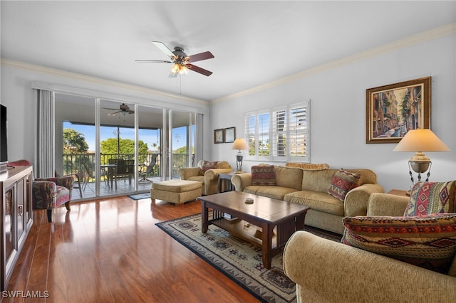 living room featuring crown molding, ceiling fan, and hardwood / wood-style flooring