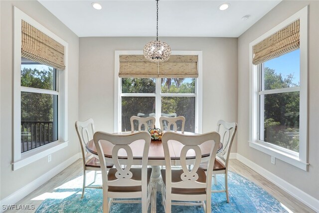 dining area featuring light wood-type flooring