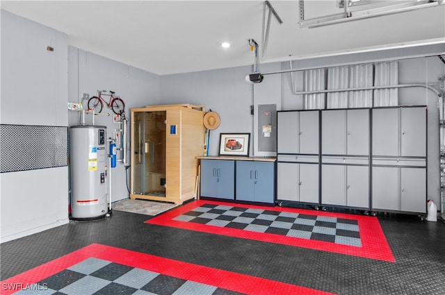 garage featuring electric panel, water heater, and a garage door opener