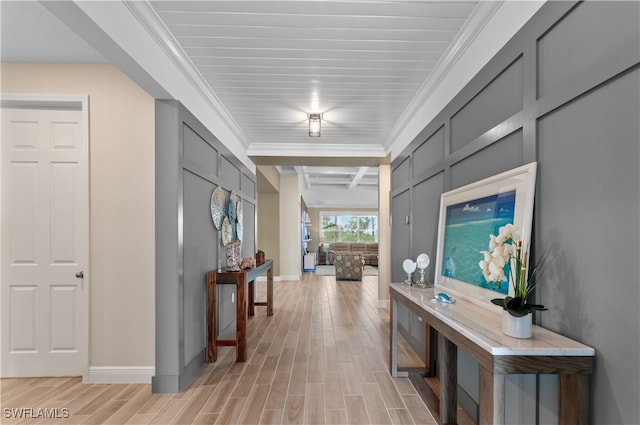 corridor featuring light hardwood / wood-style floors and ornamental molding