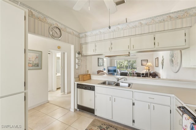 kitchen featuring white cabinetry, ceiling fan, sink, white appliances, and light tile patterned flooring