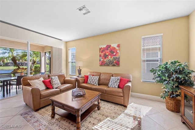 living room with light tile patterned floors