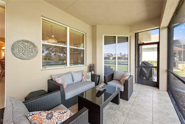 sunroom / solarium featuring plenty of natural light