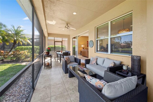 sunroom / solarium with ceiling fan