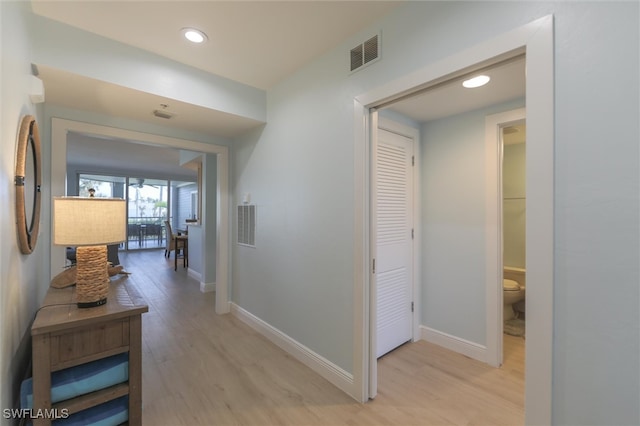 hall featuring light hardwood / wood-style flooring