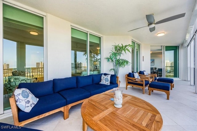 view of patio / terrace featuring ceiling fan and an outdoor hangout area