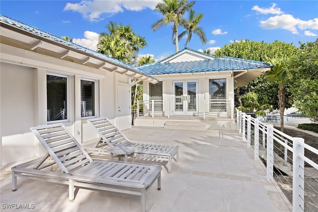 view of patio featuring french doors