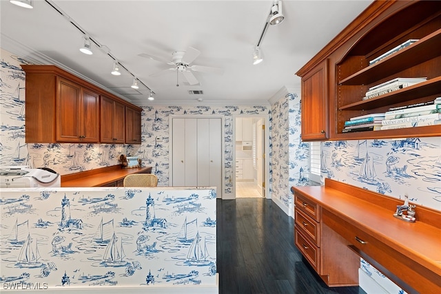 kitchen with crown molding, dark hardwood / wood-style flooring, rail lighting, and ceiling fan