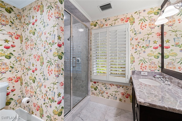 bathroom with crown molding, a shower with door, vanity, and toilet