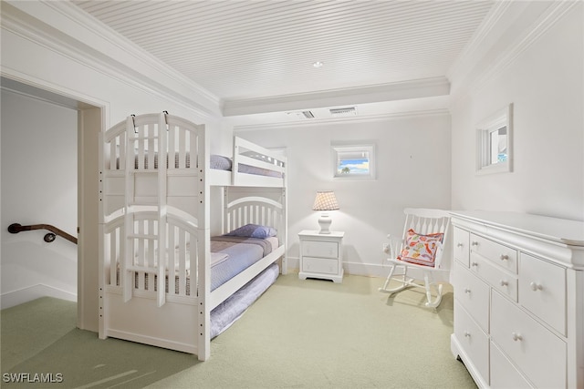 bedroom with crown molding and light colored carpet