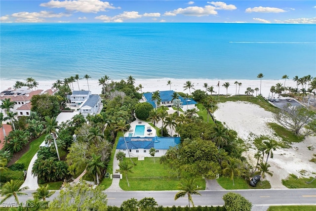 aerial view featuring a water view and a beach view