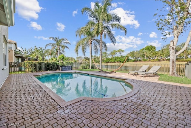 view of pool featuring a patio