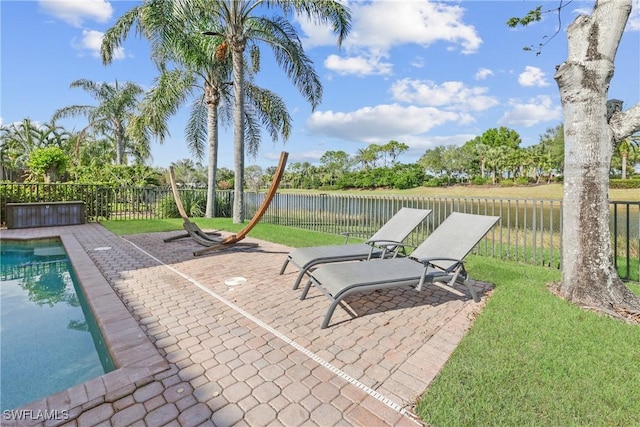 view of patio / terrace featuring a fenced in pool