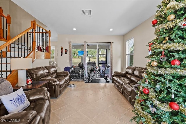 living room featuring light tile patterned floors