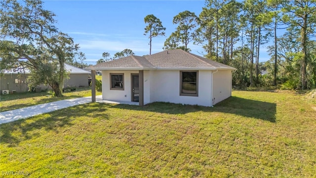 view of front of home with a front yard