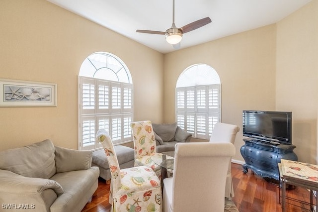 living room with hardwood / wood-style floors and ceiling fan