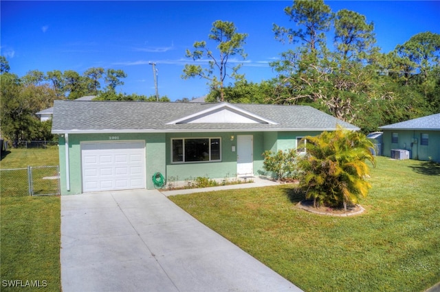 ranch-style home featuring central AC unit, a garage, and a front lawn