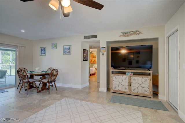 dining area with ceiling fan