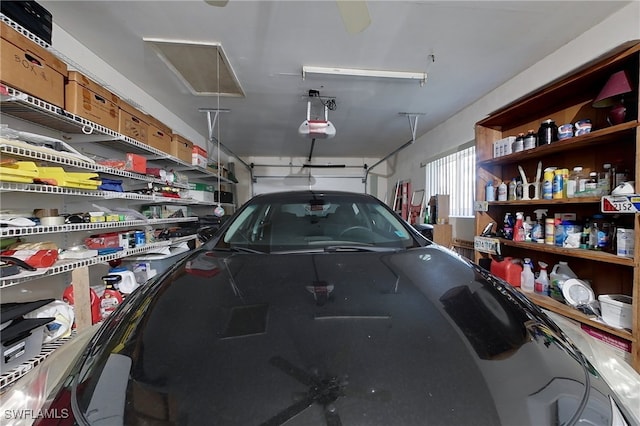 garage featuring a garage door opener