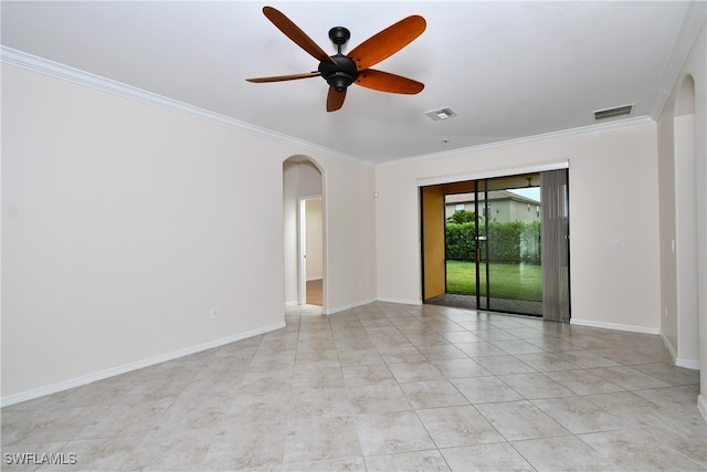 unfurnished room featuring ceiling fan and ornamental molding