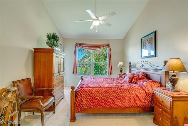 carpeted bedroom featuring high vaulted ceiling and ceiling fan