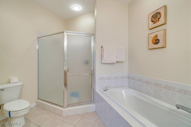 bathroom with tile patterned flooring, toilet, and independent shower and bath