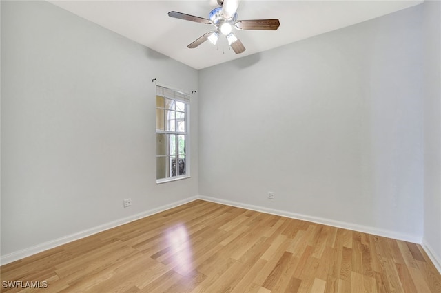 empty room with light hardwood / wood-style floors and ceiling fan