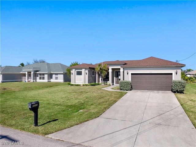 view of front of house featuring a garage and a front lawn