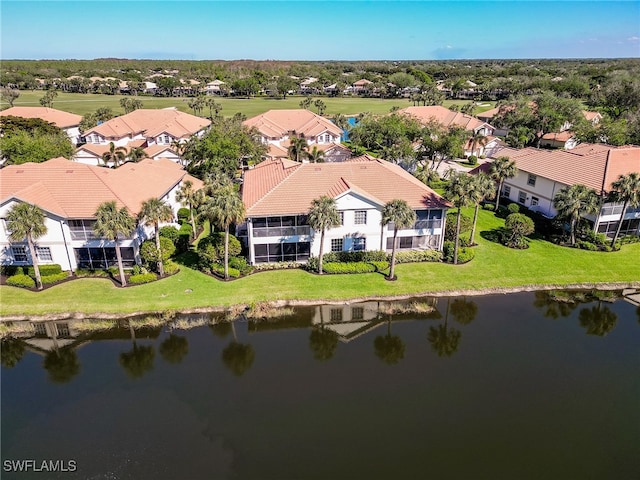 drone / aerial view with a water view