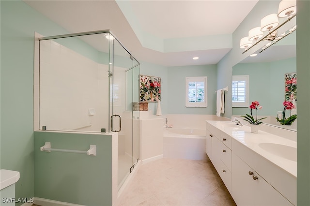 full bathroom featuring plus walk in shower, tile patterned flooring, toilet, and sink