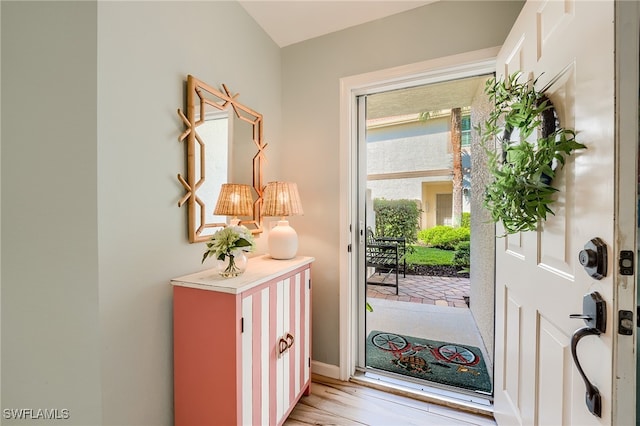 doorway with light hardwood / wood-style flooring