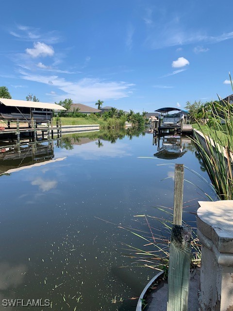 view of dock with a water view