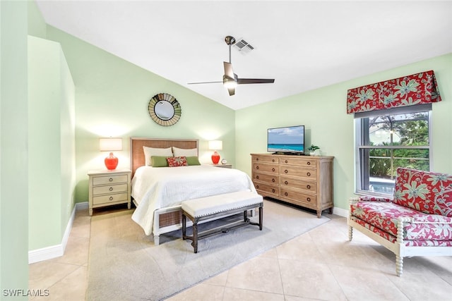 bedroom with light tile patterned floors, ceiling fan, and lofted ceiling