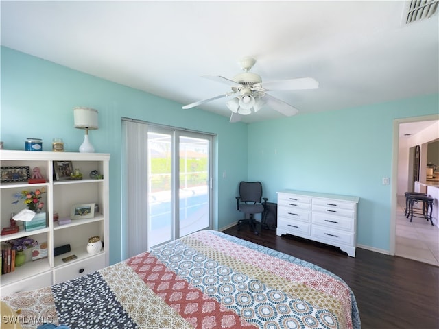 bedroom with access to exterior, ceiling fan, and dark hardwood / wood-style floors