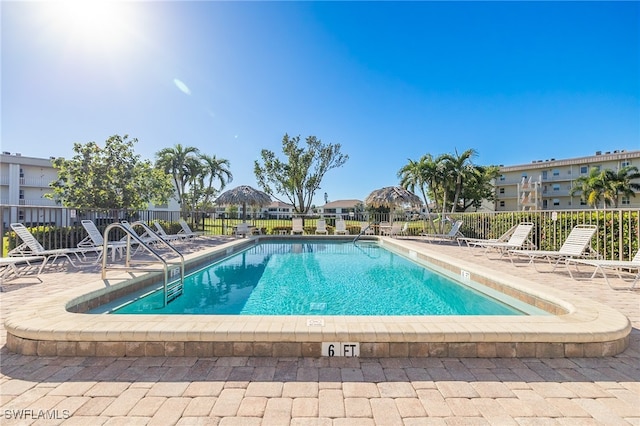 view of swimming pool with a patio