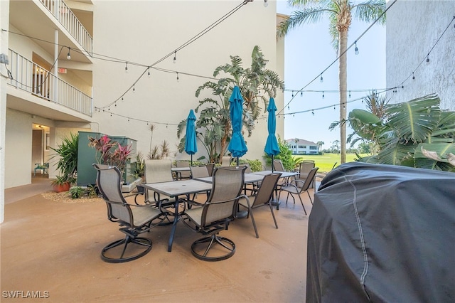 view of patio featuring a grill