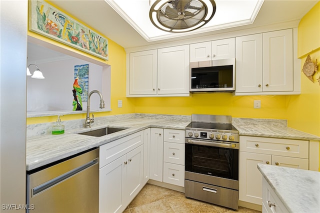 kitchen featuring white cabinets, sink, and stainless steel appliances